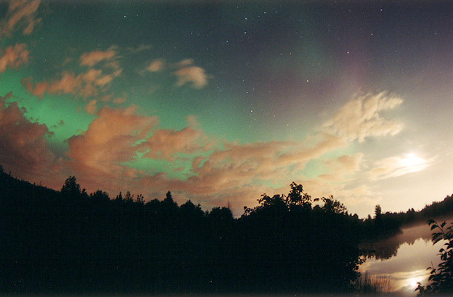 Aurora Over Clouds