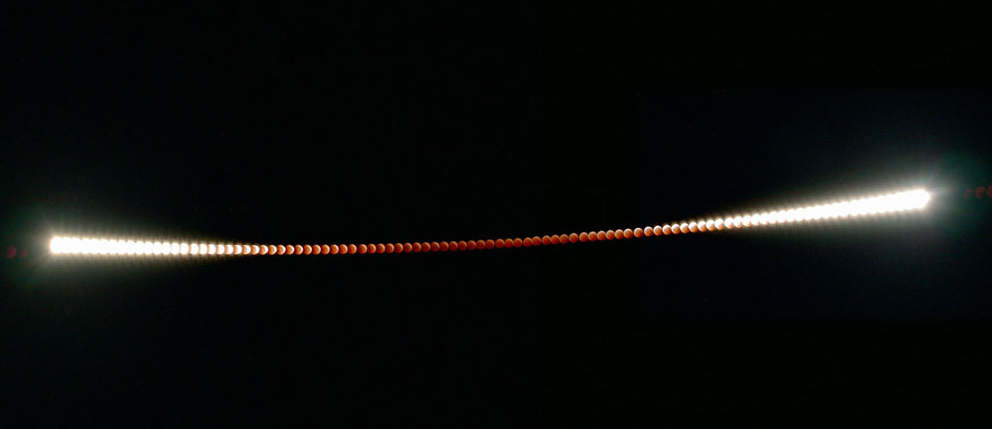 Time-lapse image of the October 2004 lunar eclipse by Forrest J. Egan.