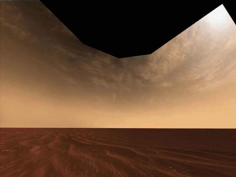 Nubes y Arena sobre el Horizonte de Marte