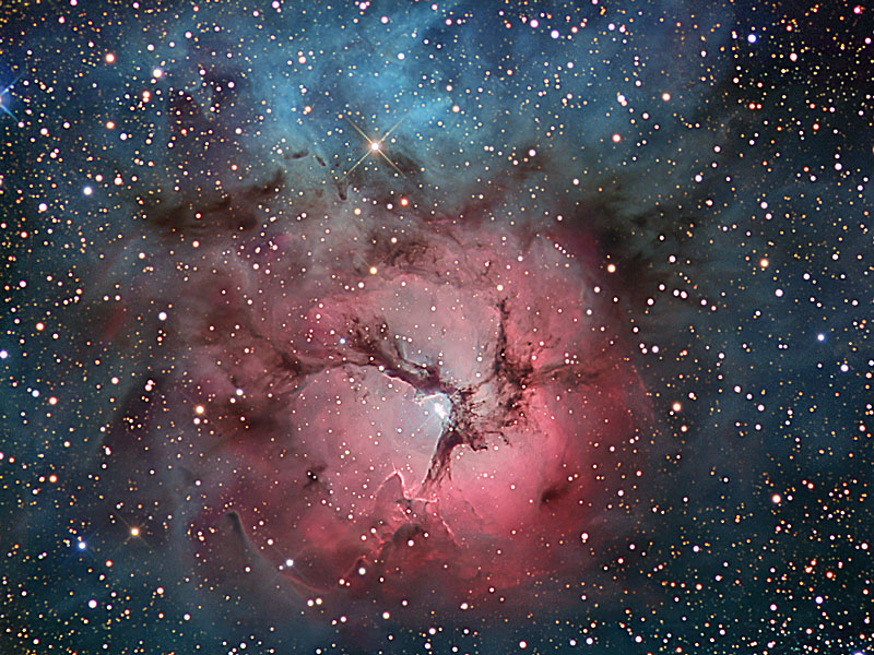 La Nebulosa Trífida en estrellas y polvo