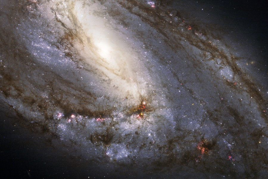 la inusual galaxia espiral M66 desde el Hubble