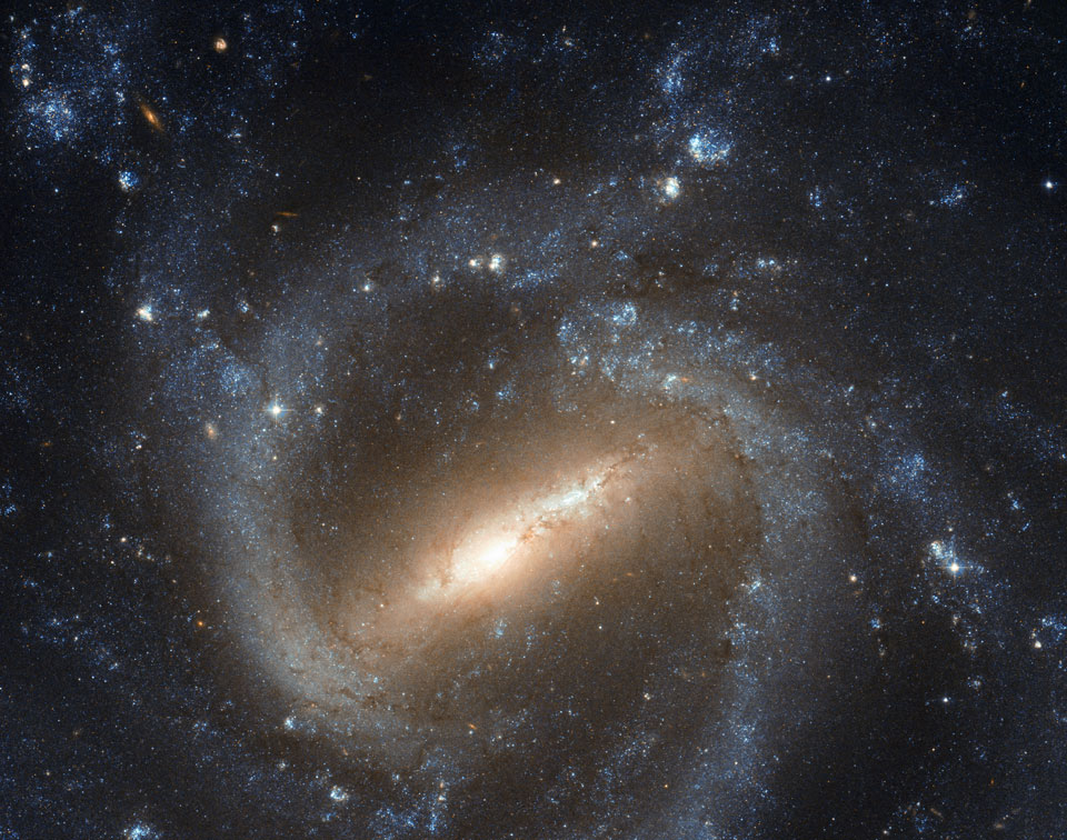 La galaxia espiral barrada NGC 1073