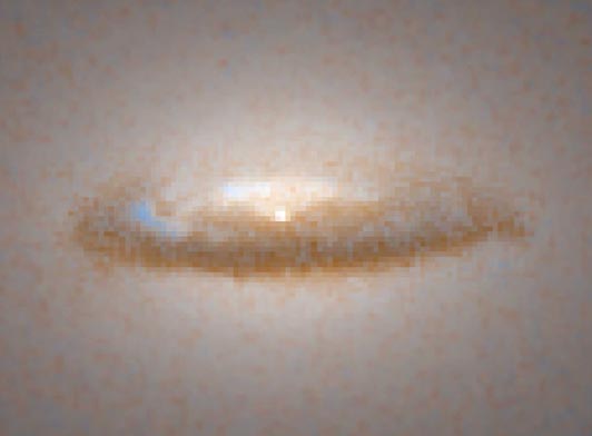 El inevitable destino del disco de polvo de NGC 7052