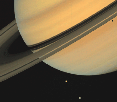 Saturno con las lunas Tetis y Dione